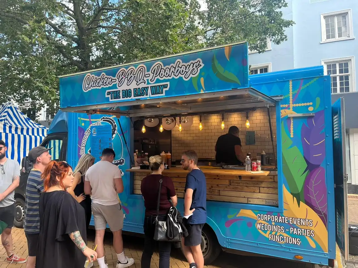 Nola Bayou Kitchen food truck serving customers in Chelmsford
